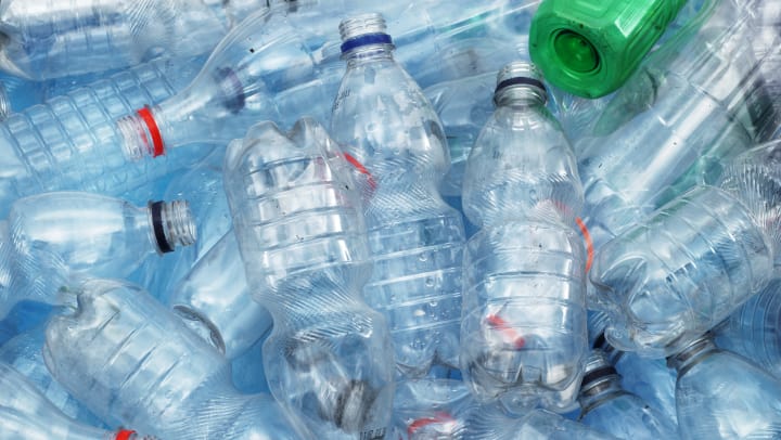 Empty plastic water bottles.